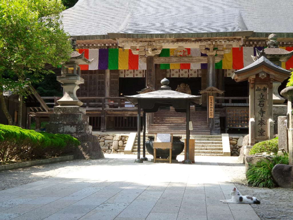 poets writing japanese poems in yamadera shrine for inspiration