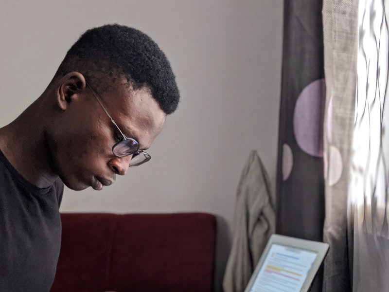 foreigner studying hiragana and katakana