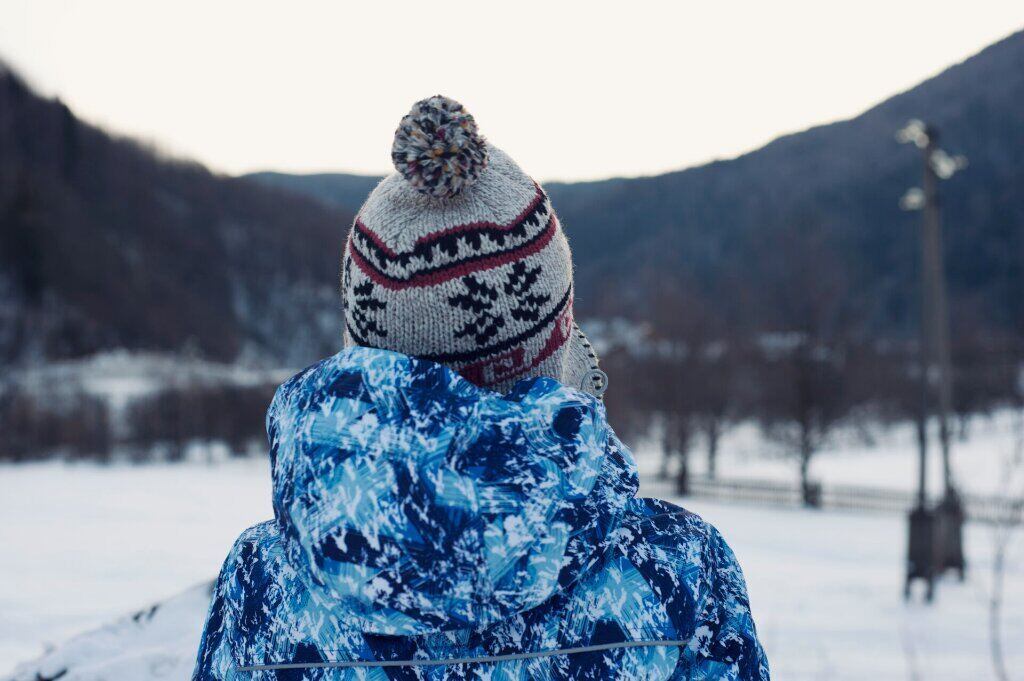 skier wearing warm clothes in japan