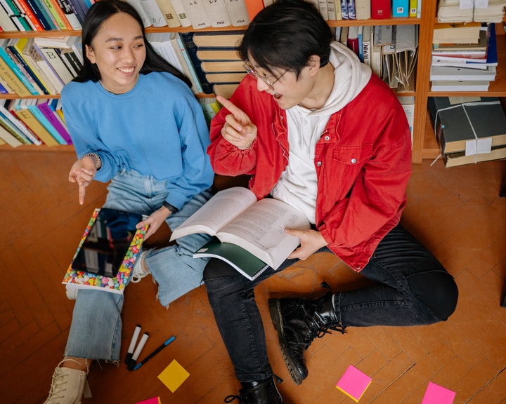 Learning Japanese tongue twister with friends in the library