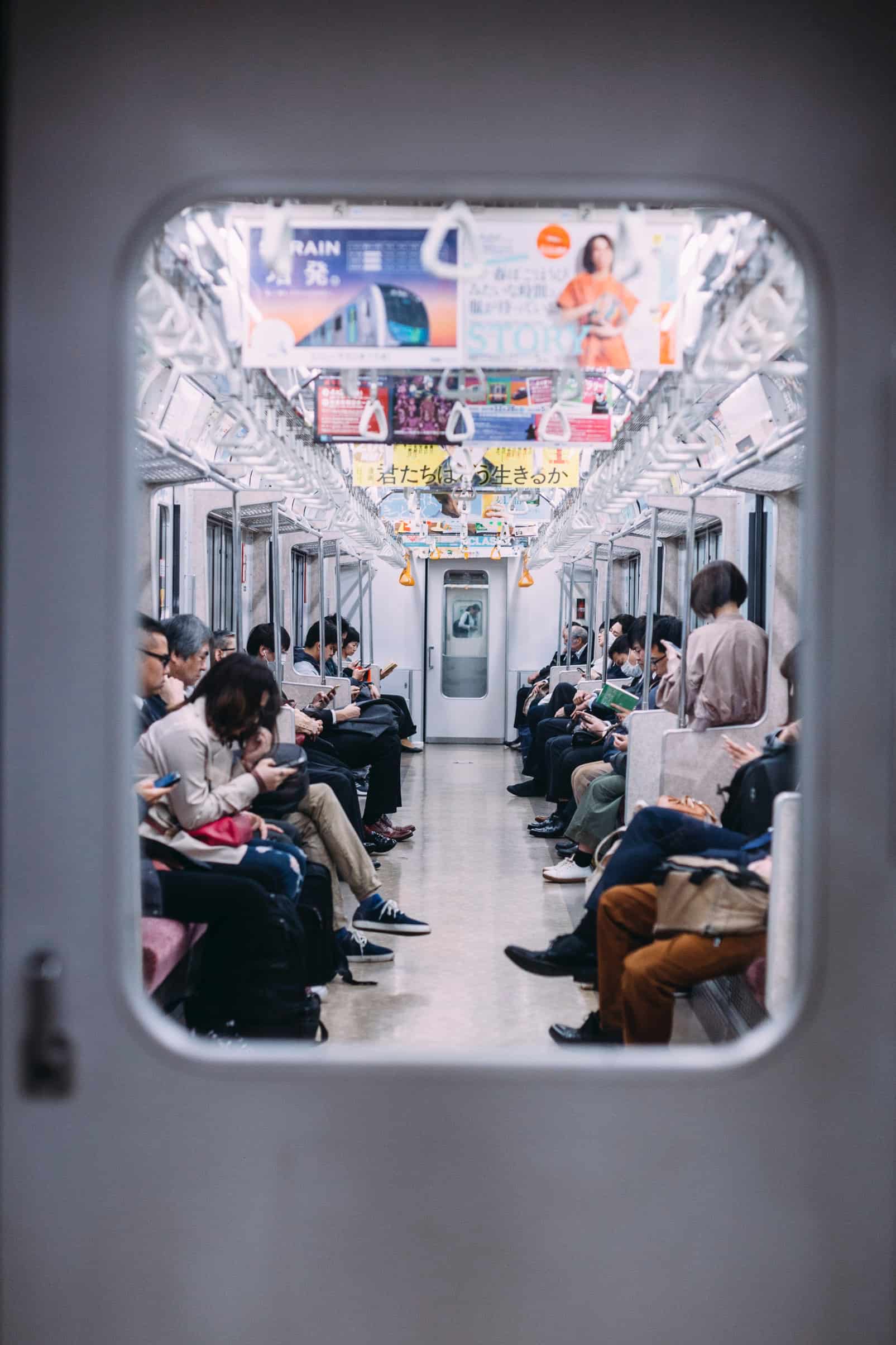 Passengers on a train at the Ikebukuro Station