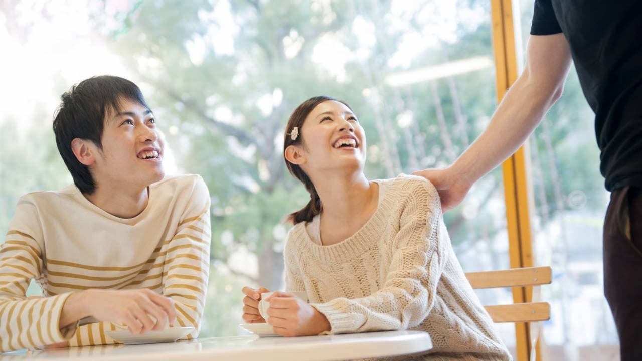 People talking and discussing while laughing