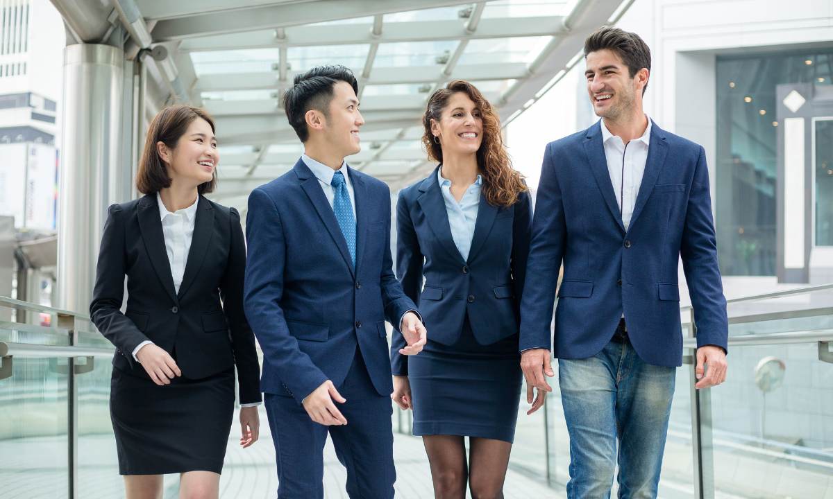 Picture of Japanese and Western buisnessmen and women talking laughing together