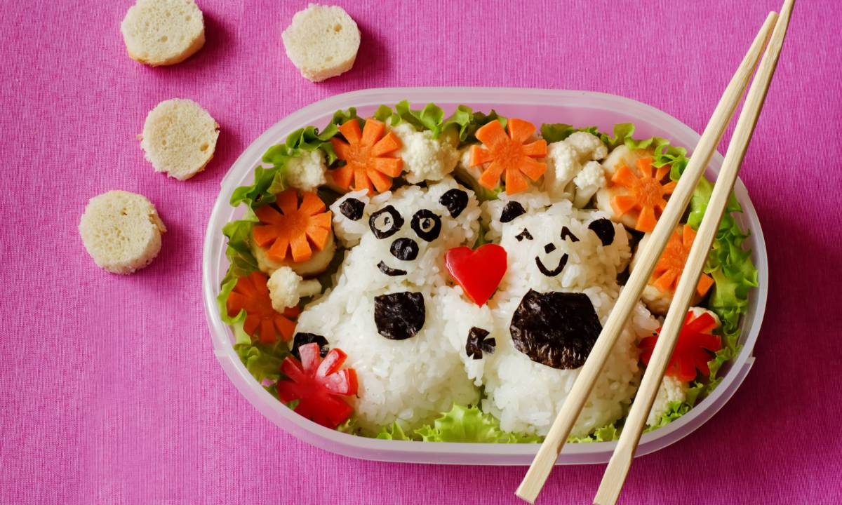 Cute Japanese bento box with bear shaped onigiri
