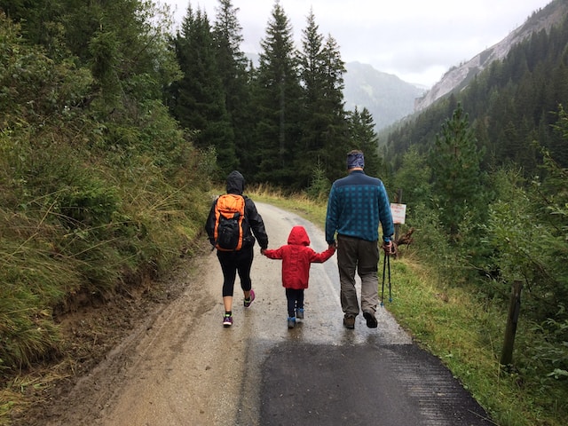A family walking along a hiking pathway