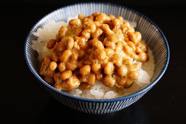 natto over rice in a bowl, a sticky and weird japanese food