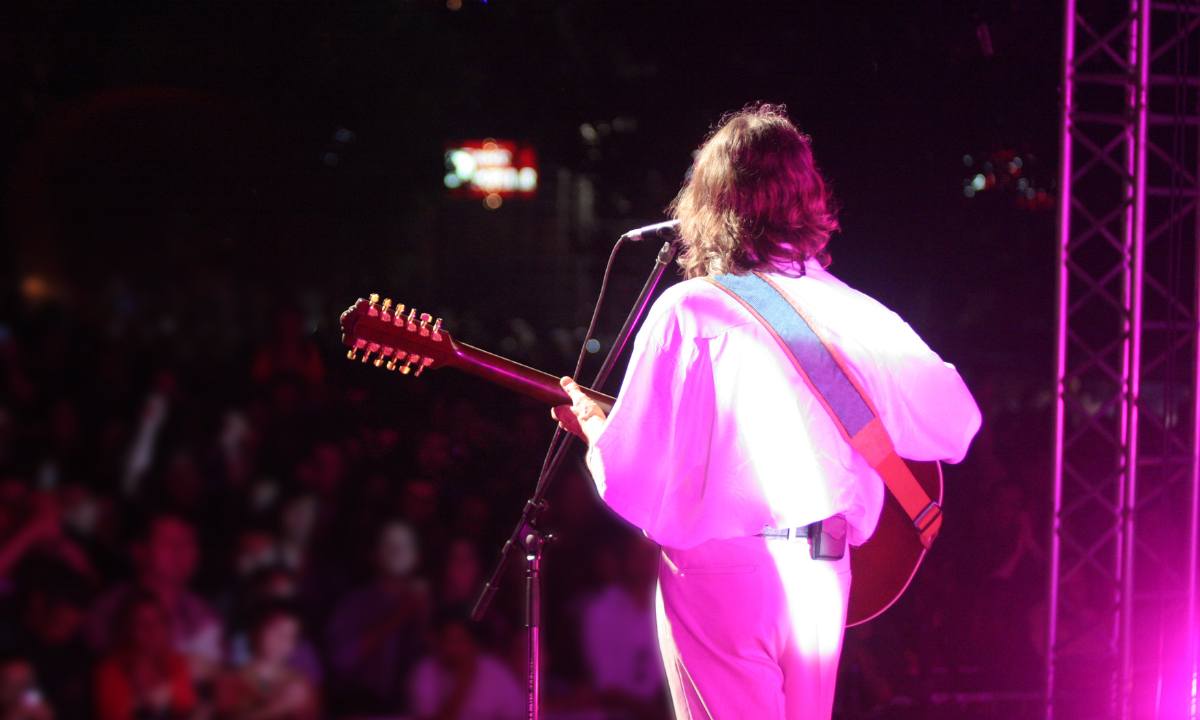 Japanese rock musician playing guitar