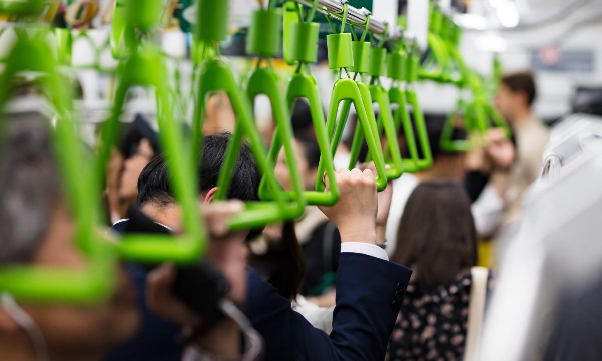 Green handles on a Tokyo Train