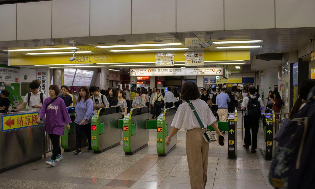 Ticket barriers at a Tokyo train station