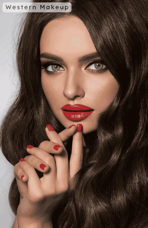 A lady wearing wester makeup with long black, wavy hair
