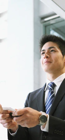 man preparing to give meishi