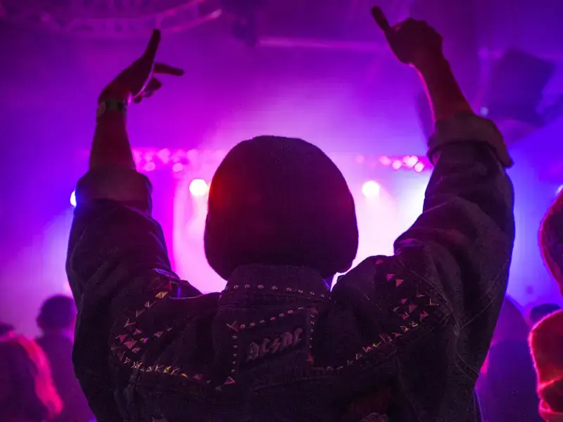 Person enjoying live music in Tokyo